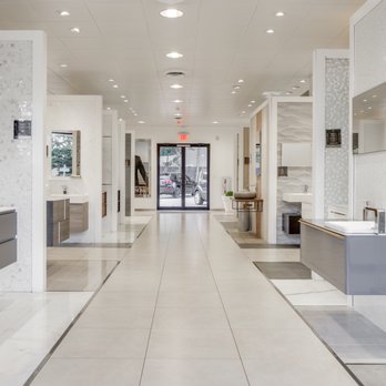 Porcelanosa - a long hallway in a building - Kitchen & Bath Near Me - Westbury, New York
