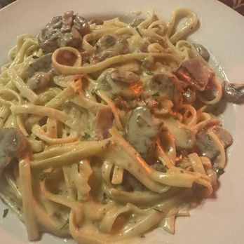 Julian's Little Italy - Fettuccine Alfredo served with mushroom and prosciutto. - Italian Near Me - Dunedin, Florida