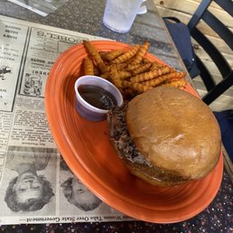 Pulled pork barbecue sandwich with sweet potato fries