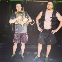Rough House Fitness and Athletics - With only weeks under my belt as a crossfitter, Rough House introduced me to Murph. This is a pic of Rick & I at the finish line