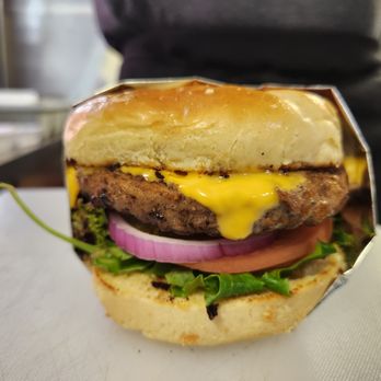 JP's Outdoor Kitchen - a burger wrapped in foil - Food Trucks Near Me JP's Outdoor Kitchen - a burger wrapped in foil - Food Trucks Near Me