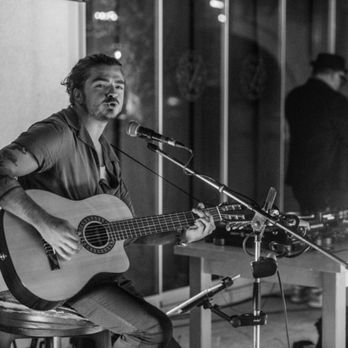 Sawyer Auger - Serenading the crowd with the best tunes, he sets the perfect vibe for the cocktail hour at the wedding reception. - Musicians Near Me Sawyer Auger - Serenading the crowd with the best tunes, he sets the perfect vibe for the cocktail hour at the wedding reception. - Musicians Near Me