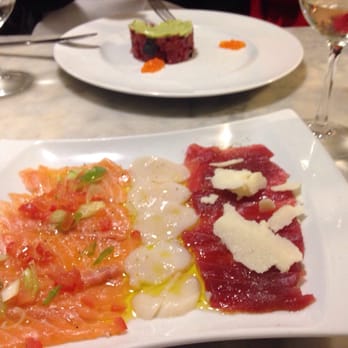 Restaurant de l'Ogenblik - Carpaccio trio. Salmon, scallop and tuna with oil and hard cheese. - Belgian Near Me - Brussels, BRU Restaurant de l'Ogenblik - Carpaccio trio. Salmon, scallop and tuna with oil and hard cheese. - Belgian Near Me - Brussels, BRU