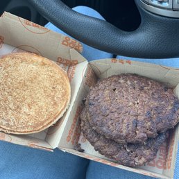 This is the quarter pounder w cheese I got after my complaint! Where's my cheese and condiments
