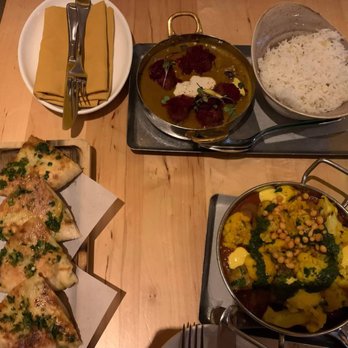 Da Gama - Sweet potato kulcha bottom left, aboberra curry top, and aloo gobi bravas bottom right - Indian Near Me - Houston, Texas Da Gama - Sweet potato kulcha bottom left, aboberra curry top, and aloo gobi bravas bottom right - Indian Near Me - Houston, Texas