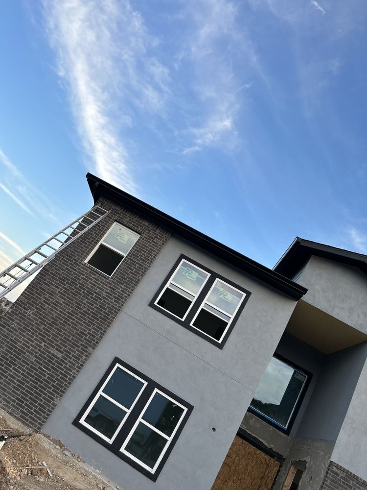 Slide of Gonzalez Seamless Rain Gutters