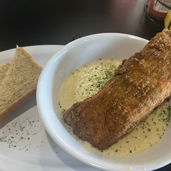 Sol'Delish - fried salmon and grits with wheat toast - Soul Food Near Me - Charlotte, North Carolina Sol'Delish - fried salmon and grits with wheat toast - Soul Food Near Me - Charlotte, North Carolina