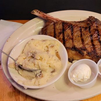 Texas Roadhouse - Bone In big Ribeye with mashed potatoes - Steakhouses Near Me - Gainesville, Georgia Texas Roadhouse - Bone In big Ribeye with mashed potatoes - Steakhouses Near Me - Gainesville, Georgia