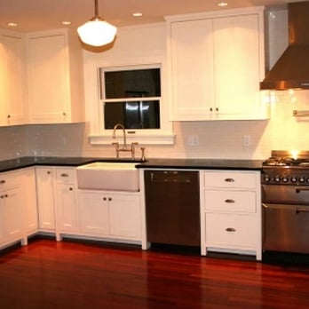 Kovscek Renovation - a kitchen with stainless steel appliances - General Contractors Near Me