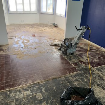 Jb & Sons Construction - Removal of engineered wood floor with cool machine! - General Contractors Near Me - Orange, California