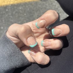 Nails & Spa - Nails have never looked so bad. Never going back....