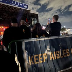 Isleta Amphitheater - These are the people blocking our view. The sign say keep aisles clear
