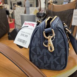 T.J. Maxx - @Tj Maxx @South Shore Market; 5/3/2026. Cute Random Designer Brand Name Bags are sold here! This one is a Mini, MK one. SO Cute = $99.00..