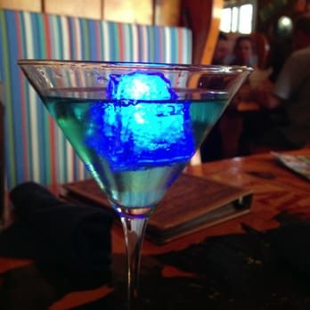 Captain John's Restaurant & Tiki Bar - Champagne cocktail with "electric" ice cube! - American Near Me - Sylvan Beach, New York Captain John's Restaurant & Tiki Bar - Champagne cocktail with "electric" ice cube! - American Near Me - Sylvan Beach, New York