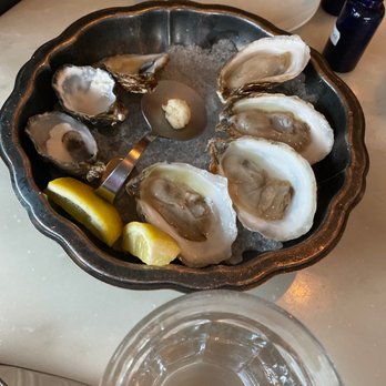 St Genevieve - Oyster with hot sauce and mignonette sauce - French Near Me - Minneapolis, Minnesota St Genevieve - Oyster with hot sauce and mignonette sauce - French Near Me - Minneapolis, Minnesota