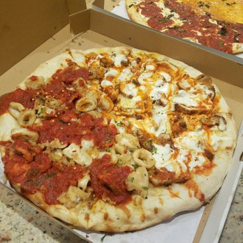 Village Trattoria - Half Calamari & Half Buffalo Chicken Pie - Italian Near Me - Summit, New Jersey Village Trattoria - Half Calamari & Half Buffalo Chicken Pie - Italian Near Me - Summit, New Jersey