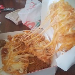 Mexican pizza smashed because they put it in the bottom of a bag full if food Mexican pizza smashed because they put it in the bottom of a bag full if food