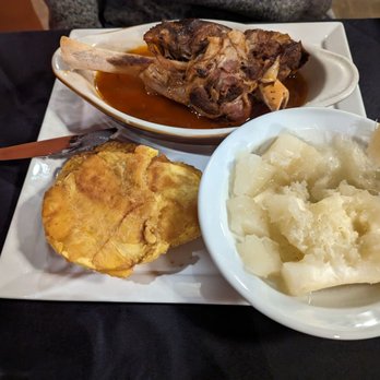 K’Bola - Lamb shank, tostones and yuca. - Cuban Near Me - Williamsburg, Virginia