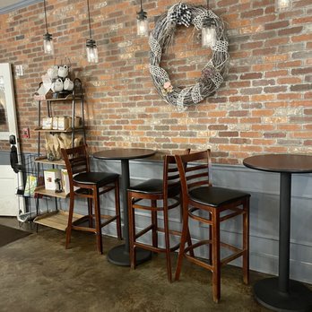 ChocoLattes - a brick wall with a wreath on it - Bakeries Near Me - Hastings, Florida
