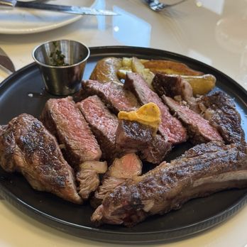 Palma Ristorante - Frenched Bone-in Cowboy Ribeye 22 oz, medium - Steakhouses Near Me - Burbank, California Palma Ristorante - Frenched Bone-in Cowboy Ribeye 22 oz, medium - Steakhouses Near Me - Burbank, California