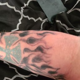 He did these flames missed lines and instead of ink he has alot of unnecessary blood lines 500$ for 1.15 hrs of subpar work.