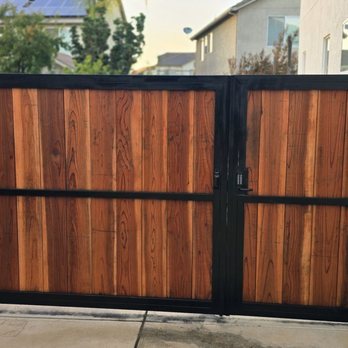 Alejandro Quality Fence - 12ft drive in gate stained redwood - Fences & Gates Near Me
