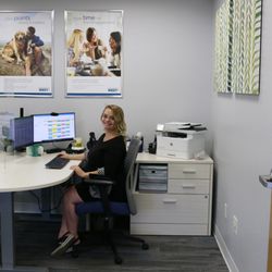 Credit Union West - Employee working in office at Credit Union West branch in Prescott.