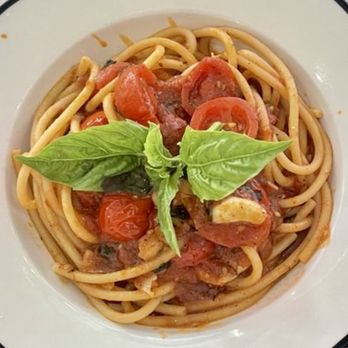 Nittis Italian Restaurant in Hell's Kitchen - Bucatini Pomodoro - Italian Near Me - New York, New York Nittis Italian Restaurant in Hell's Kitchen - Bucatini Pomodoro - Italian Near Me - New York, New York