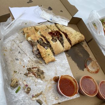 Romas Pizza Pasta and Subs - A large Stromboli - Pizza Near Me - Roanoke Rapids, North Carolina Romas Pizza Pasta and Subs - A large Stromboli - Pizza Near Me - Roanoke Rapids, North Carolina