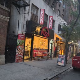 Exterior outside entrance of Madison Pizza NYC - New York, New York Exterior outside entrance of Madison Pizza NYC - New York, New York