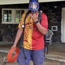 Aloha Termite & Pest Control - SAFETY FIRST, always. Our lead Zebulun, getting suited up to enter your home.