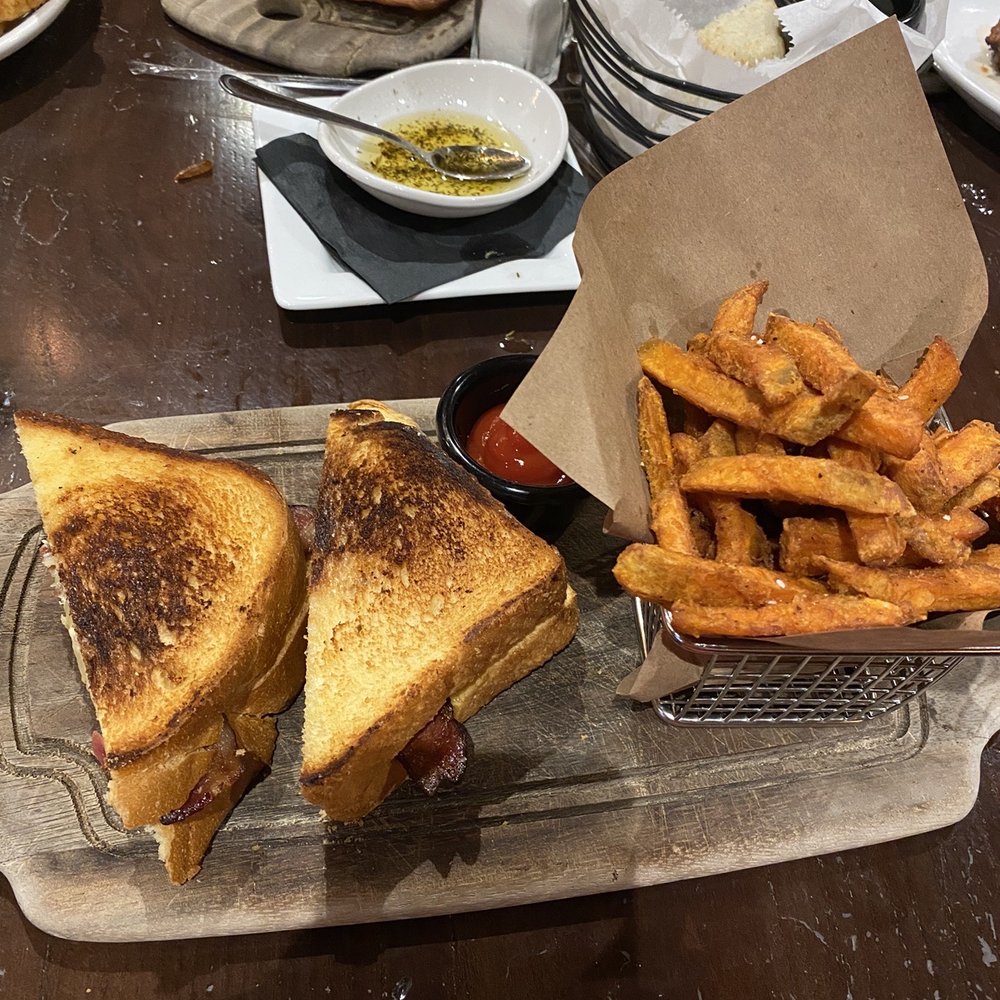 Precinct 10 - Rustic Grilled Cheese with sweet potato fries. Yummy! In the back: margherita flatbread, bread with butter & oil. - New American Near Me - Weymouth, Massachusetts Precinct 10 - Rustic Grilled Cheese with sweet potato fries. Yummy! In the back: margherita flatbread, bread with butter & oil. - New American Near Me - Weymouth, Massachusetts