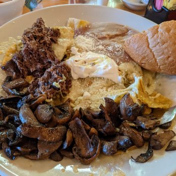 Los Chilakillers - My chilaquiles with mushrooms and barbacoa. - Mexican Near Me - Austin, Texas Los Chilakillers - My chilaquiles with mushrooms and barbacoa. - Mexican Near Me - Austin, Texas