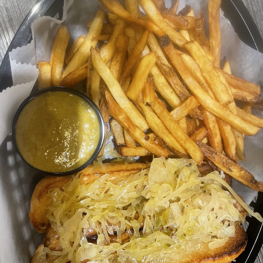 Penn Brewery - a hot dog with sauerkraut and french fries - Breweries Near Me - Pittsburgh, Pennsylvania