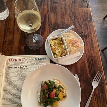 La Fromagerie - Cucumber salad and zucchini dip. Riesling wine - French Near Me - Alexandria, Virginia La Fromagerie - Cucumber salad and zucchini dip. Riesling wine - French Near Me - Alexandria, Virginia