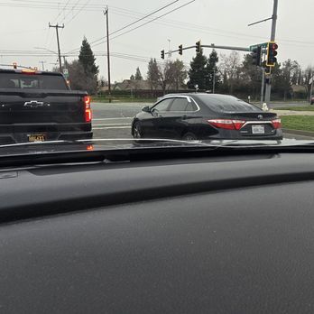 Safety Prime Auto Glass - A crack is visible at the lower portion of the window, extending horizontally from left to right. - Car Window Tinting Near Me - Carmichael, California