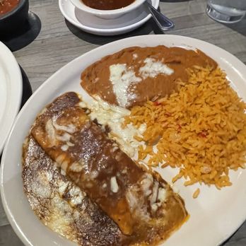 Tequila's - Cheese enchilada with red sauce. A little sweet like a mole. - Mexican Near Me - Nashville, Tennessee