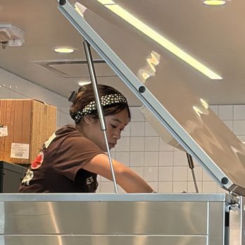 sweetgreen - Healthy Salads, Wraps, and Bowls - Close up refilling the machine - Salad Near Me - Sacramento, California