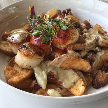 OEB Breakfast - River Landing - Scallop poutine and traditional Benny. - Breakfast & Brunch Near Me - Saskatoon, Saskatchewan OEB Breakfast - River Landing - Scallop poutine and traditional Benny. - Breakfast & Brunch Near Me - Saskatoon, Saskatchewan