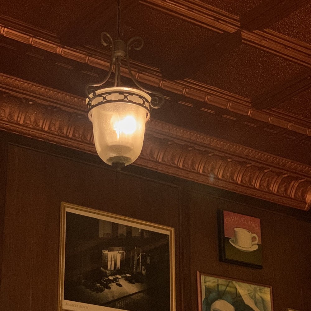 Bitter End Coffee House - a light hanging from the ceiling - Coffee & Tea Near Me - Grand Rapids, Michigan Bitter End Coffee House - a light hanging from the ceiling - Coffee & Tea Near Me - Grand Rapids, Michigan