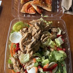 La Bella Pizza - Grilled chicken salad & I added roasted red peppers, provolone cheese & hard boiled egg. The garlic pizza bread is also delicious.