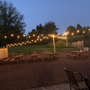 Bierhaul - a patio with tables, chairs, and string lights - Pizza Near Me - Thornton, Pennsylvania Bierhaul - a patio with tables, chairs, and string lights - Pizza Near Me - Thornton, Pennsylvania