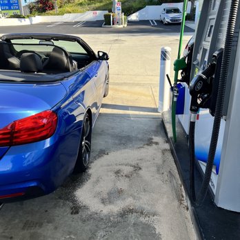 Chevron - a blue convertible parked at a gas station - Gas Stations Near Me - Torrance, California Chevron - a blue convertible parked at a gas station - Gas Stations Near Me - Torrance, California