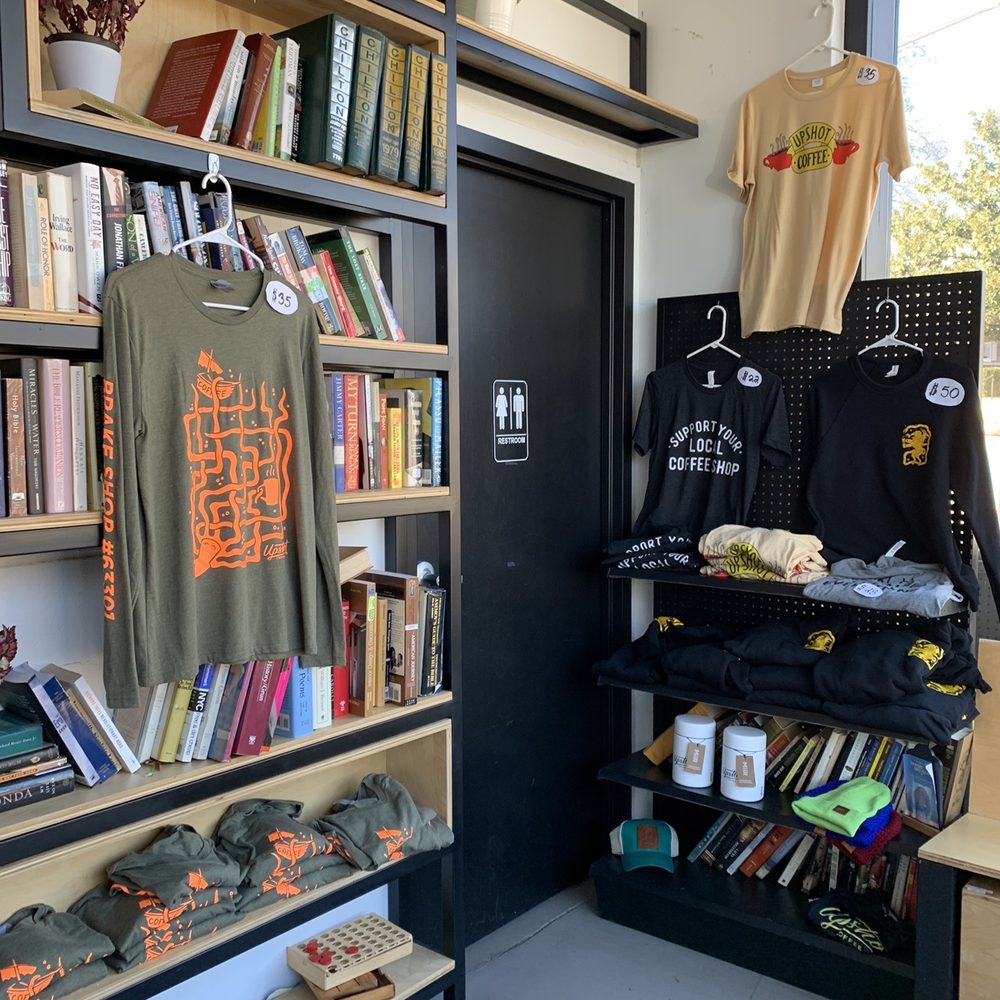 Upshot Coffee Brake Shop - a bookshelf full of merchandise - Coffee & Tea Near Me - Saint Charles, Missouri Upshot Coffee Brake Shop - a bookshelf full of merchandise - Coffee & Tea Near Me - Saint Charles, Missouri