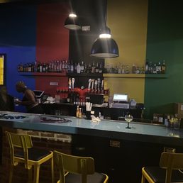 Bar area. Bartenders make a strong drink Bar area. Bartenders make a strong drink