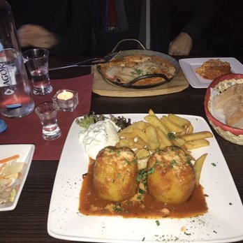 Asteria - Stuffed peppers with rice and chicken in metaxasauce - Greek Near Me - Berlin, BE