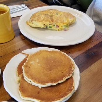 The Original Pancake House - Omelette with side of 3 buttermilk pancakes (the cakes look larger than they are and the omelette looks smaller due to the angle) - Pancakes Near Me - Normal, Illinois The Original Pancake House - Omelette with side of 3 buttermilk pancakes (the cakes look larger than they are and the omelette looks smaller due to the angle) - Pancakes Near Me - Normal, Illinois