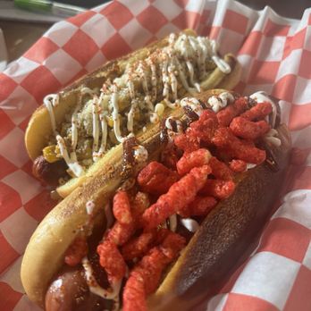 Cholo Dogs - El Borracho (back) and Franco Finisher (front) - Hot Dogs Near Me - Orlando, Florida Cholo Dogs - El Borracho (back) and Franco Finisher (front) - Hot Dogs Near Me - Orlando, Florida