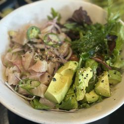 Yellowtail poke bowl I added jalapeños and this is huge I took half home!