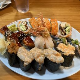Spider roll, eel, sweet shrimp, Saba, Uni, creamy scallop. Spider roll, eel, sweet shrimp, Saba, Uni, creamy scallop.